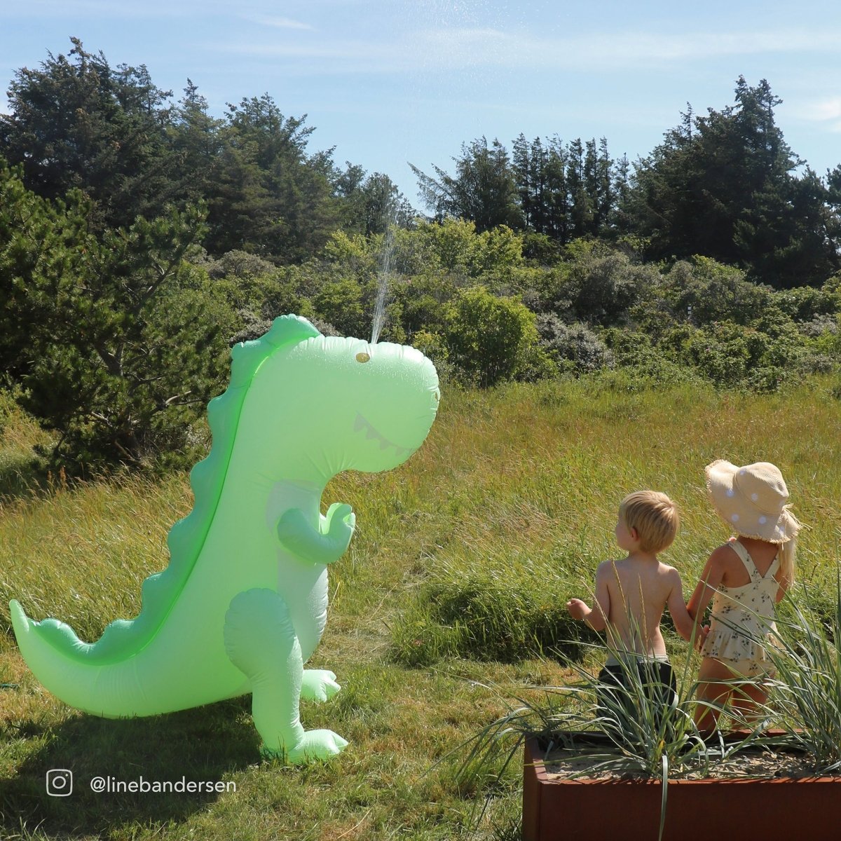 Inflatable Giant Surfing Dino Sprinkler - SUNNYLiFE UK